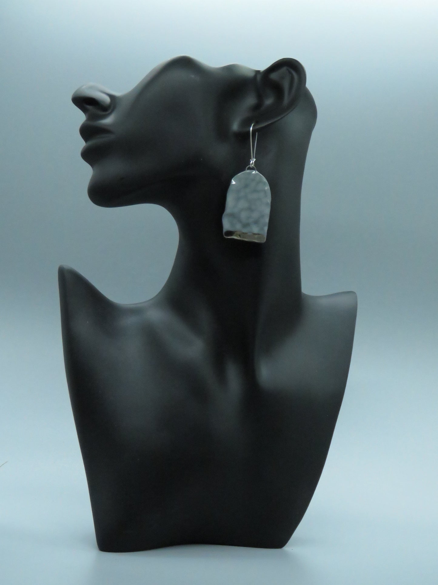 Grey hammered earrings with platinum lustre