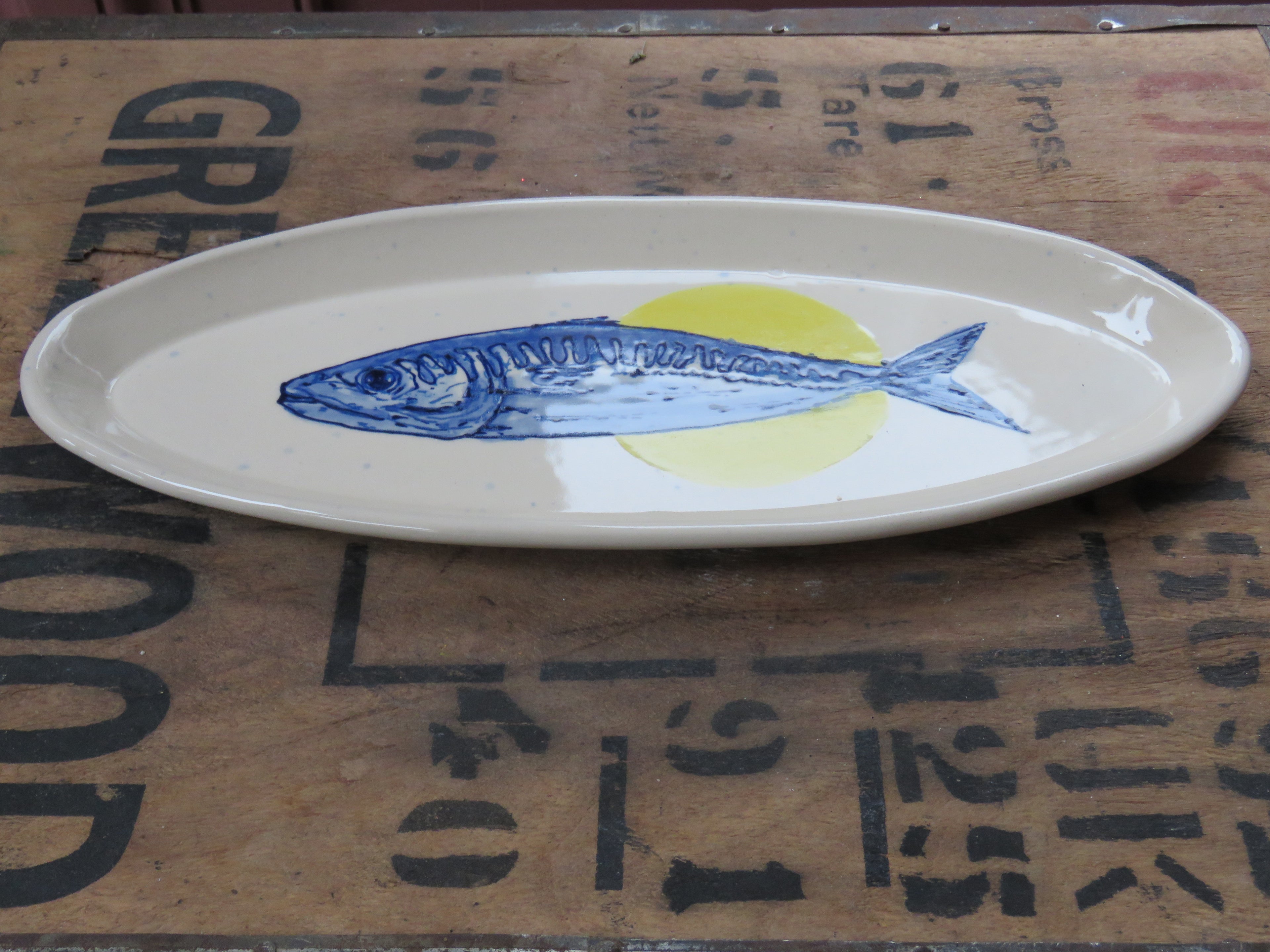 Oblong serving dish with mackerel